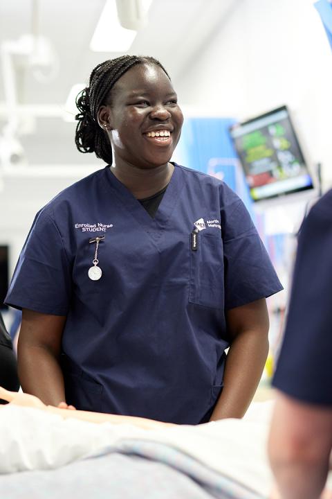 Image of nursing student looking happy